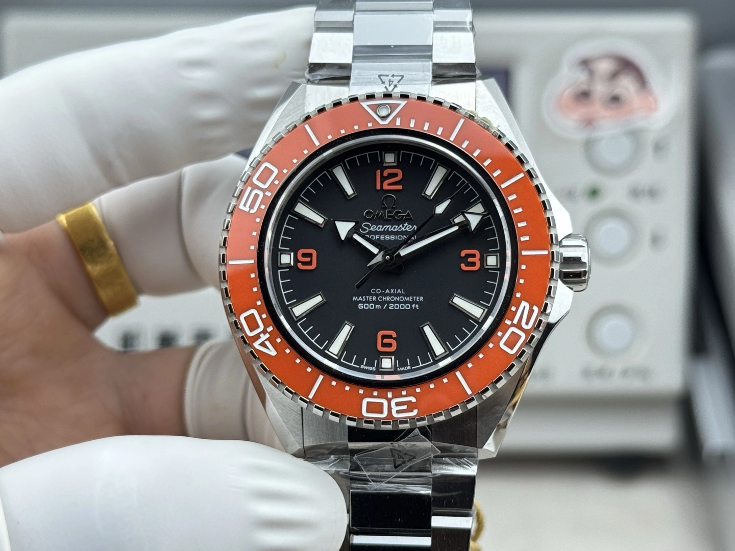 CBD Factory Omega Seamaster Planet Ocean 600M 42mm Black Dial Orange Arabic Numerals Orange Ceramic Bezel (217.30.42.21.01.003) 1:1 Super Clone – DD8912 Movement Efficient 296